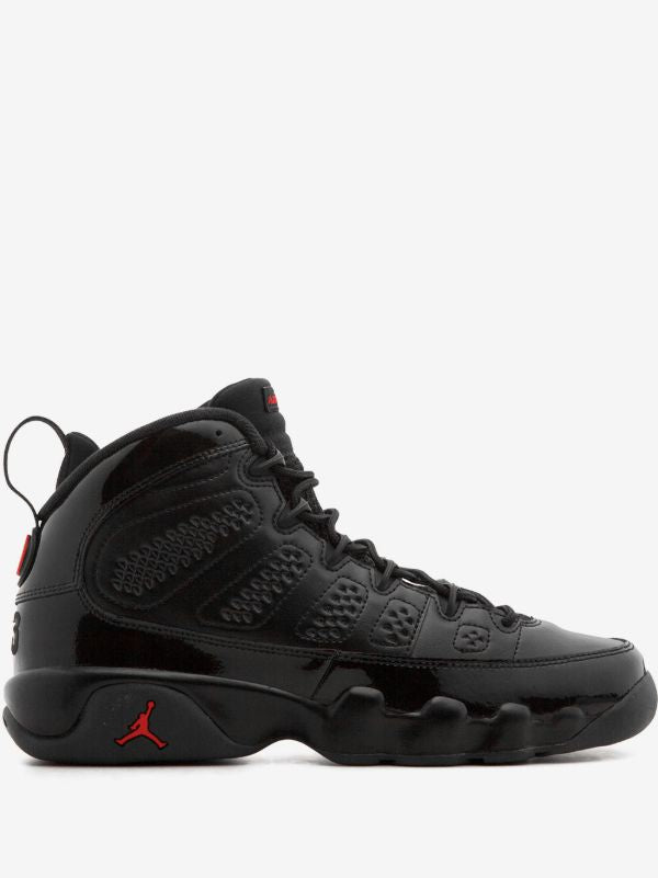 Air Jordan 9 in Black/University Red