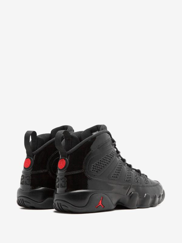 Air Jordan 9 in Black/University Red